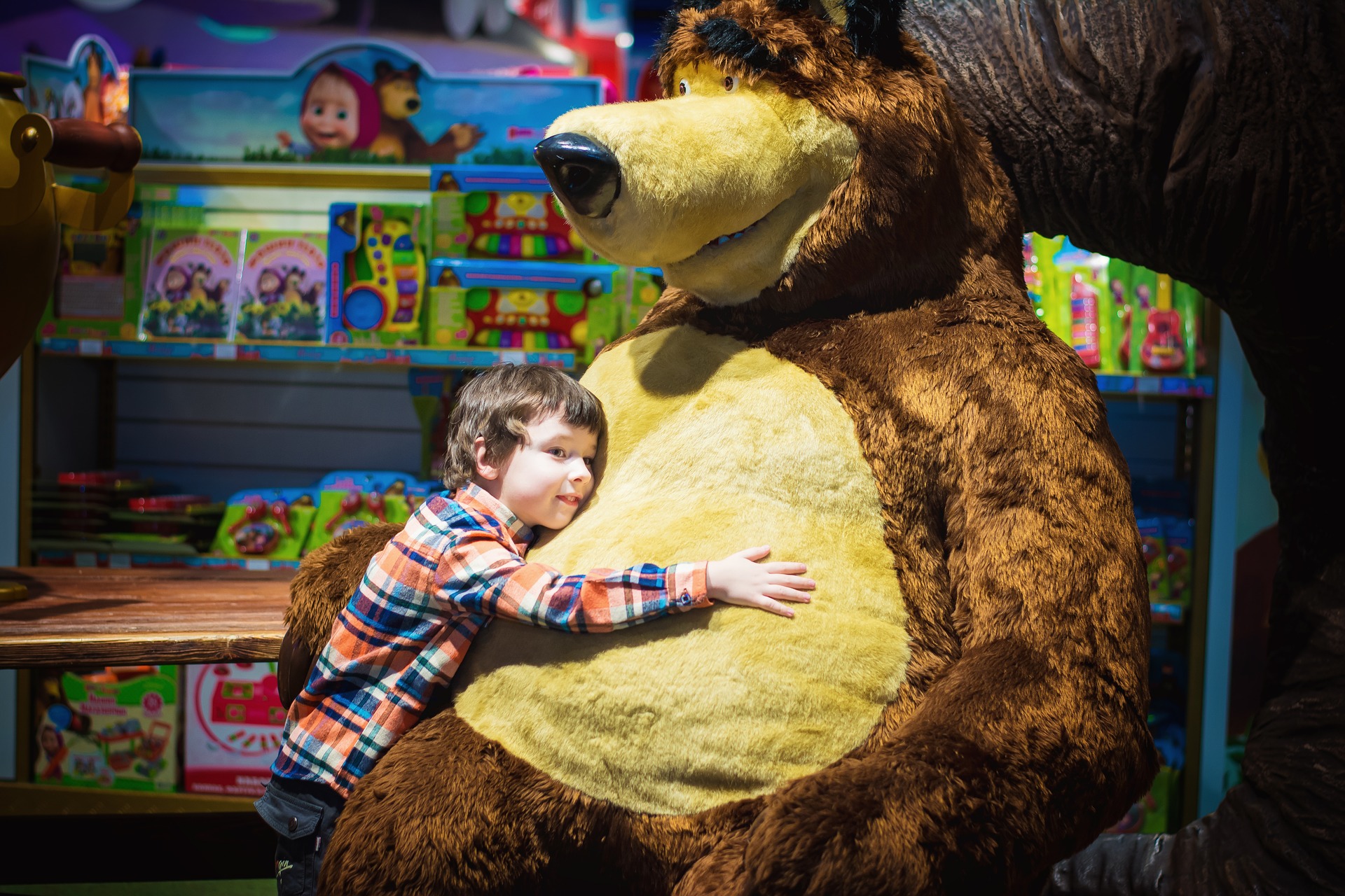 A Child Clutching A Teddy Bear